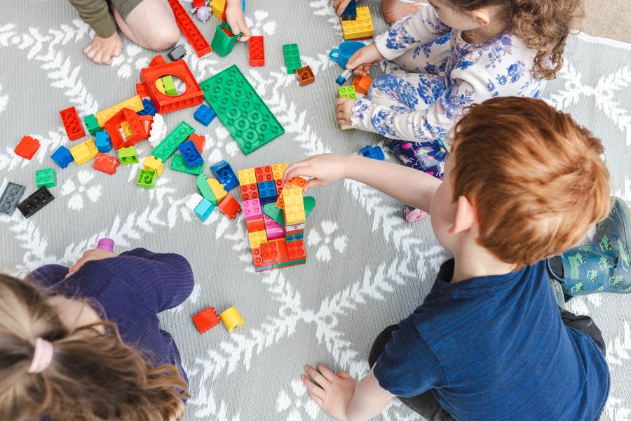 children playing with building blocks